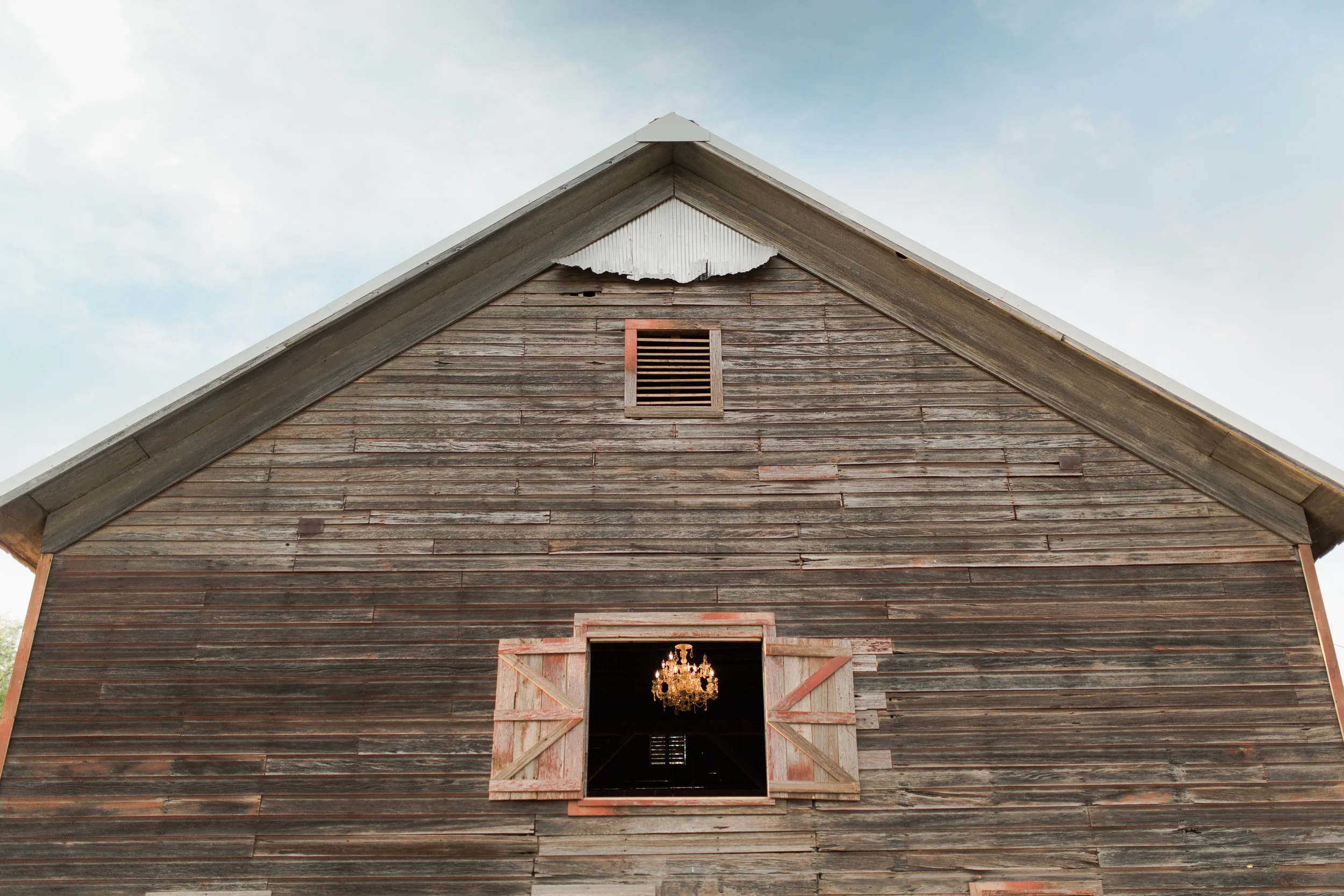 You can even see our new chandelier from the front window of the barn!