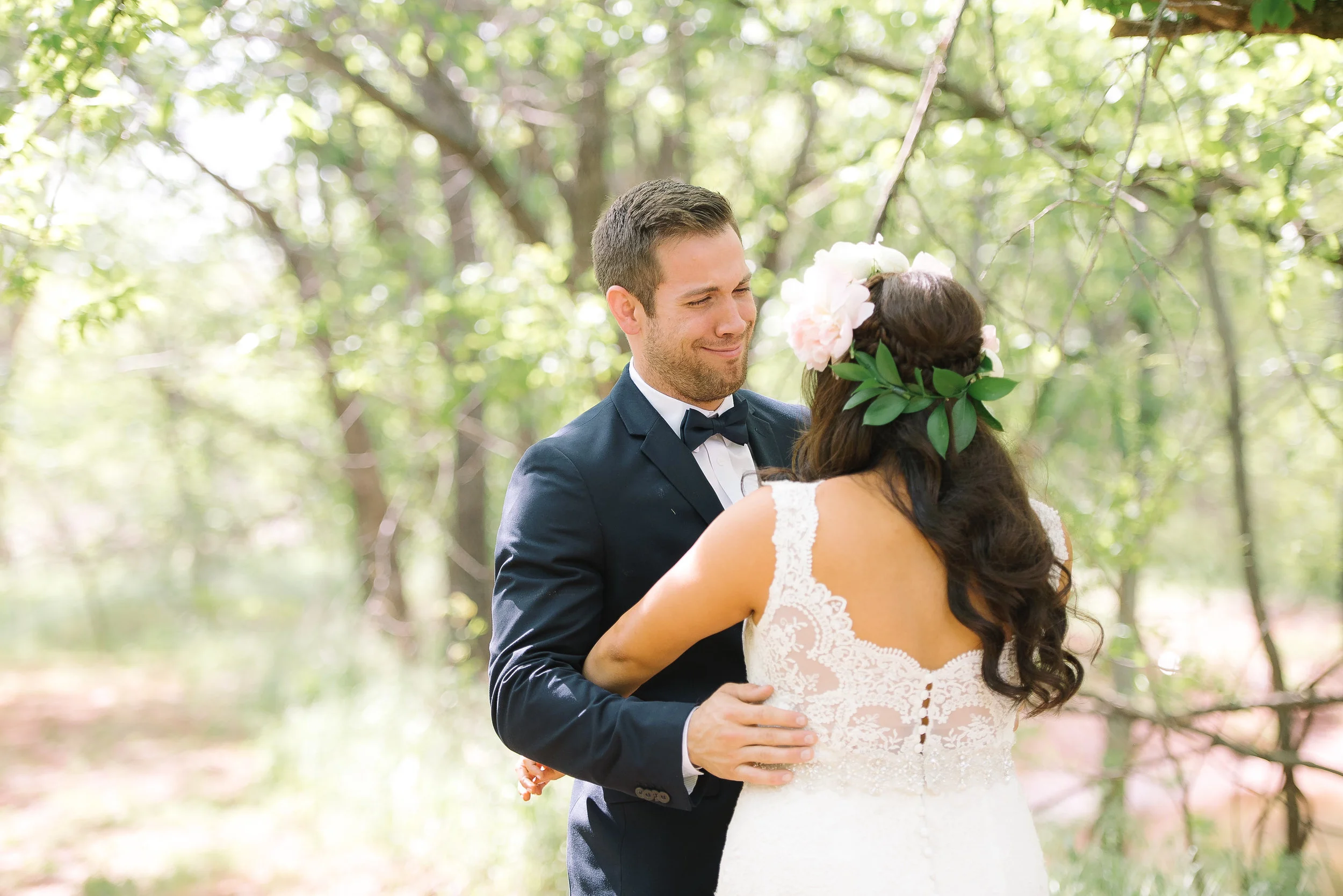 Following a little "hidden" path which opened up into a "breathtakingly beautiful, wooded area" Lucy and Dillon took their romantic first look pictures!