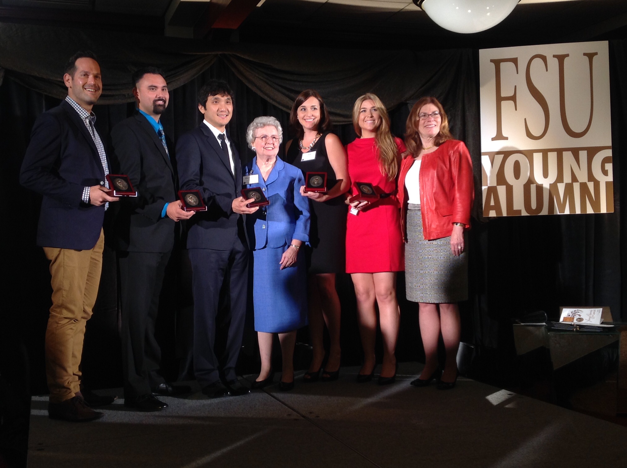 Pictured at the 2014 Young Alumni Awards Dinner (left to right): Shayne Mifsud, Kevin Garvey, Wonkak Kim, Donna Lou Askew, Layla Dowdy, Carisa Champion-Lippmann and FSU Interim President Garnett Stokes.