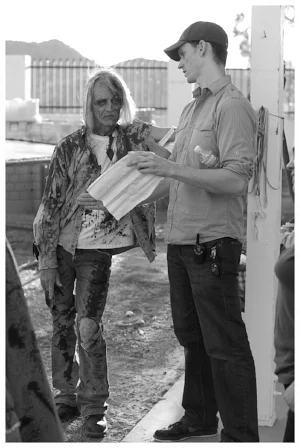 Co-Director David Whelan and extra on set