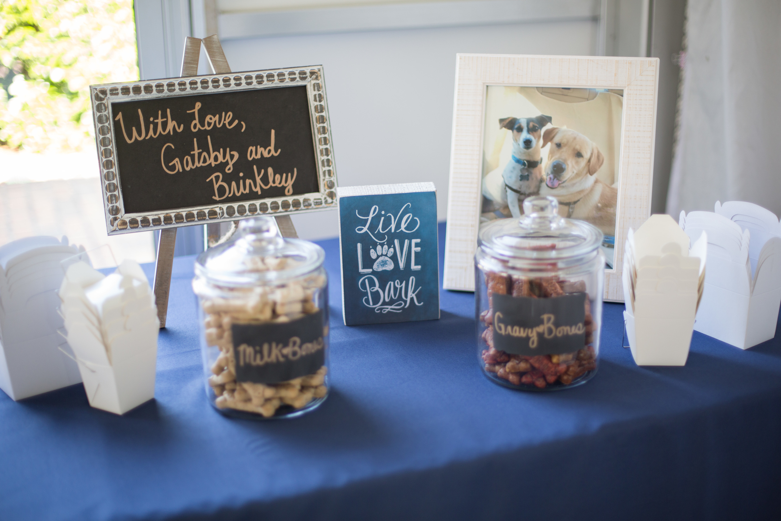 Their pups sent well wishes with a dog treat bar!