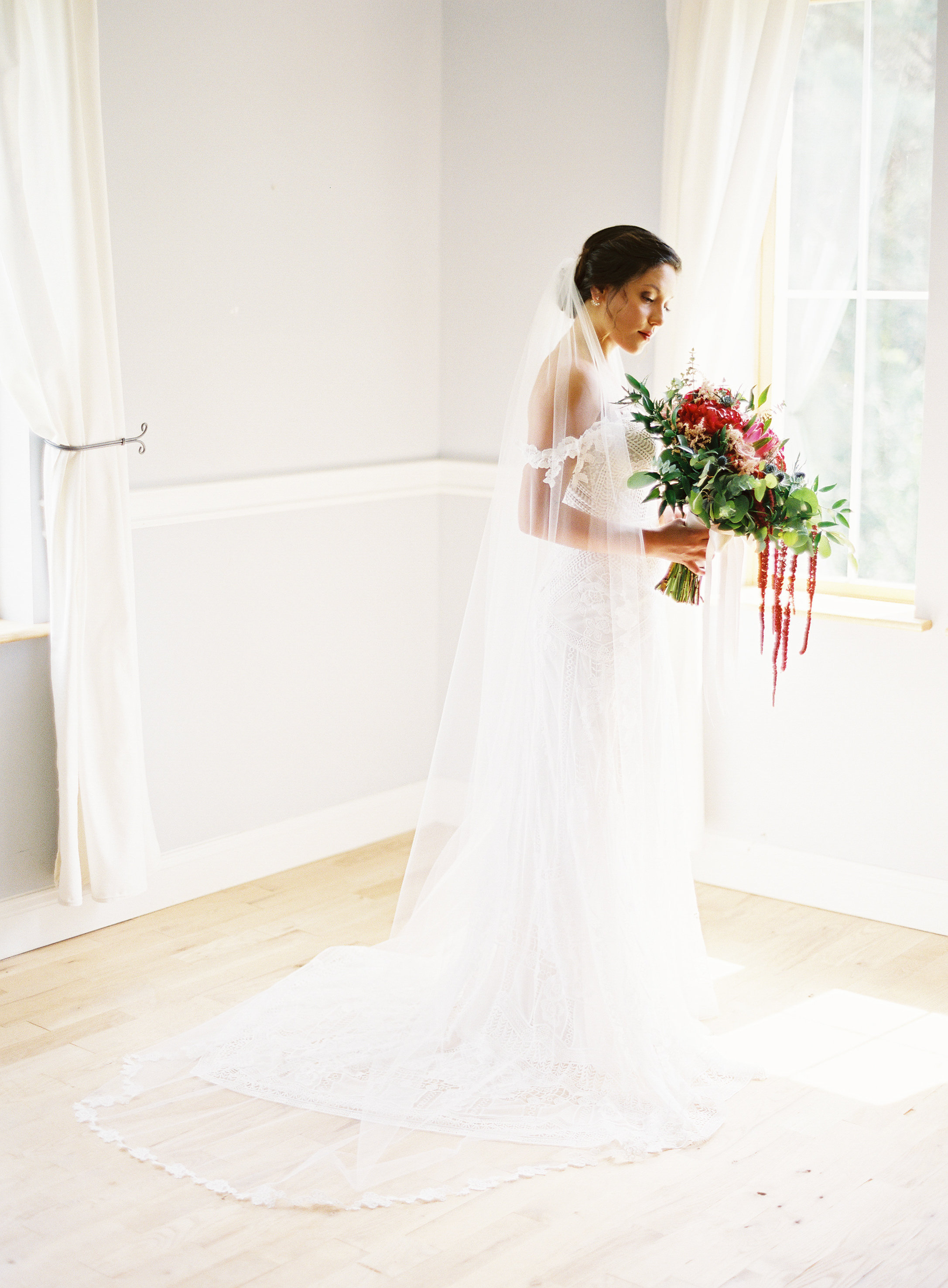 Brides, if your photographer will take the extra time to clear a corner of your getting ready space, you will be thrilled with the outcome. There are no distractions in this shot, even though the room was filled with bags, makeup, lunch, and other items belonging to the bridal party.