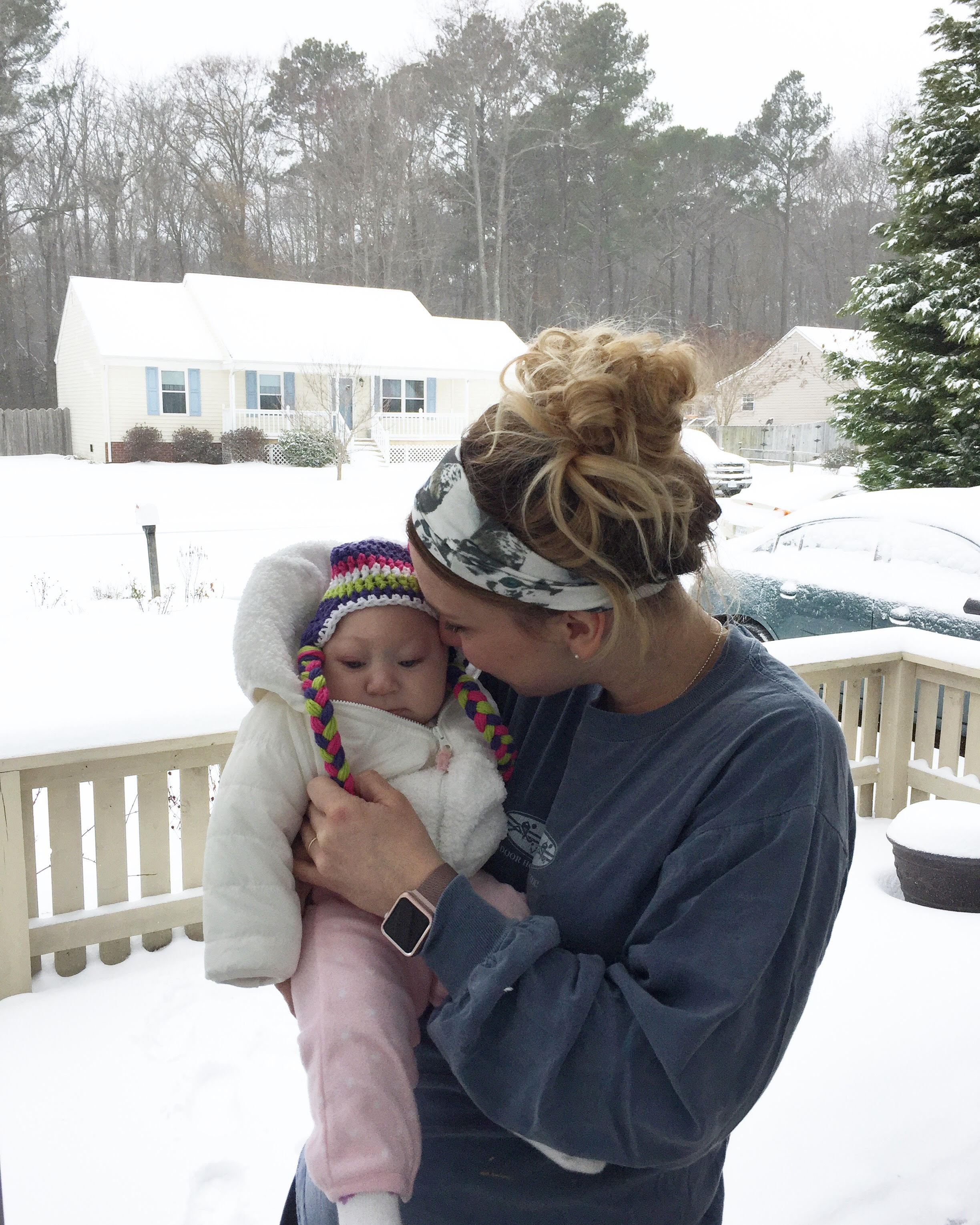 June's first snow! We put her puffy coat on just to say we did.