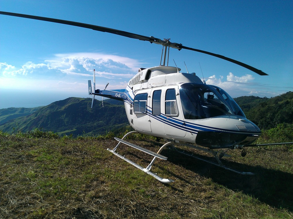 Helicopter on survey charter, Huon Peninsula, Papua New Guinea (PNG)