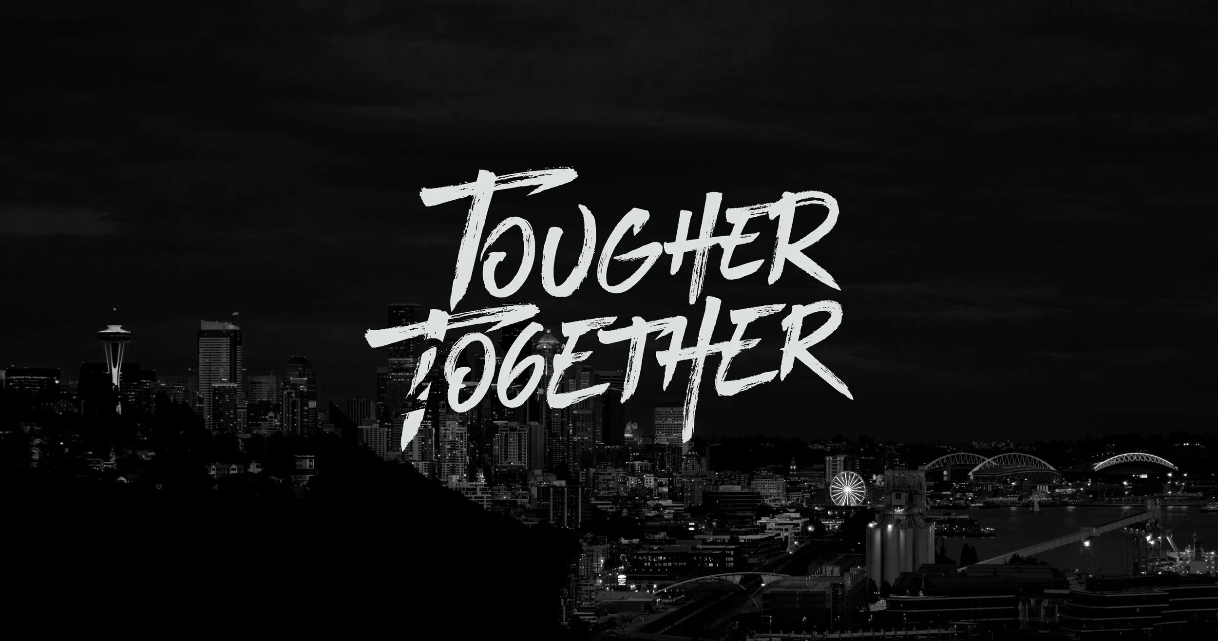 Black and white city skyline with the words 'Tougher Together' written across the center in bold, stylized text.