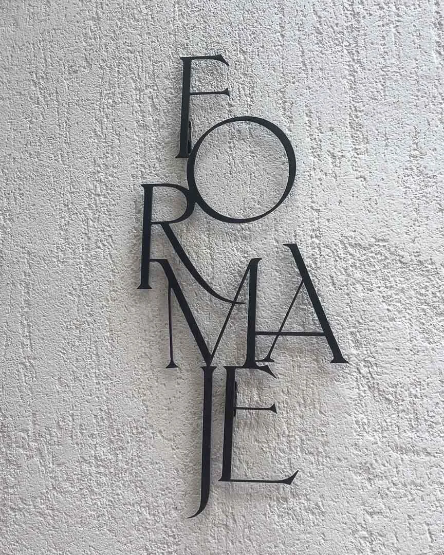Sign for Formaje Cheese Shop