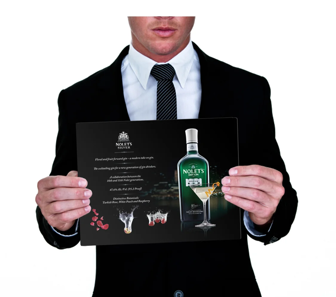 Man holding sales card.jpg