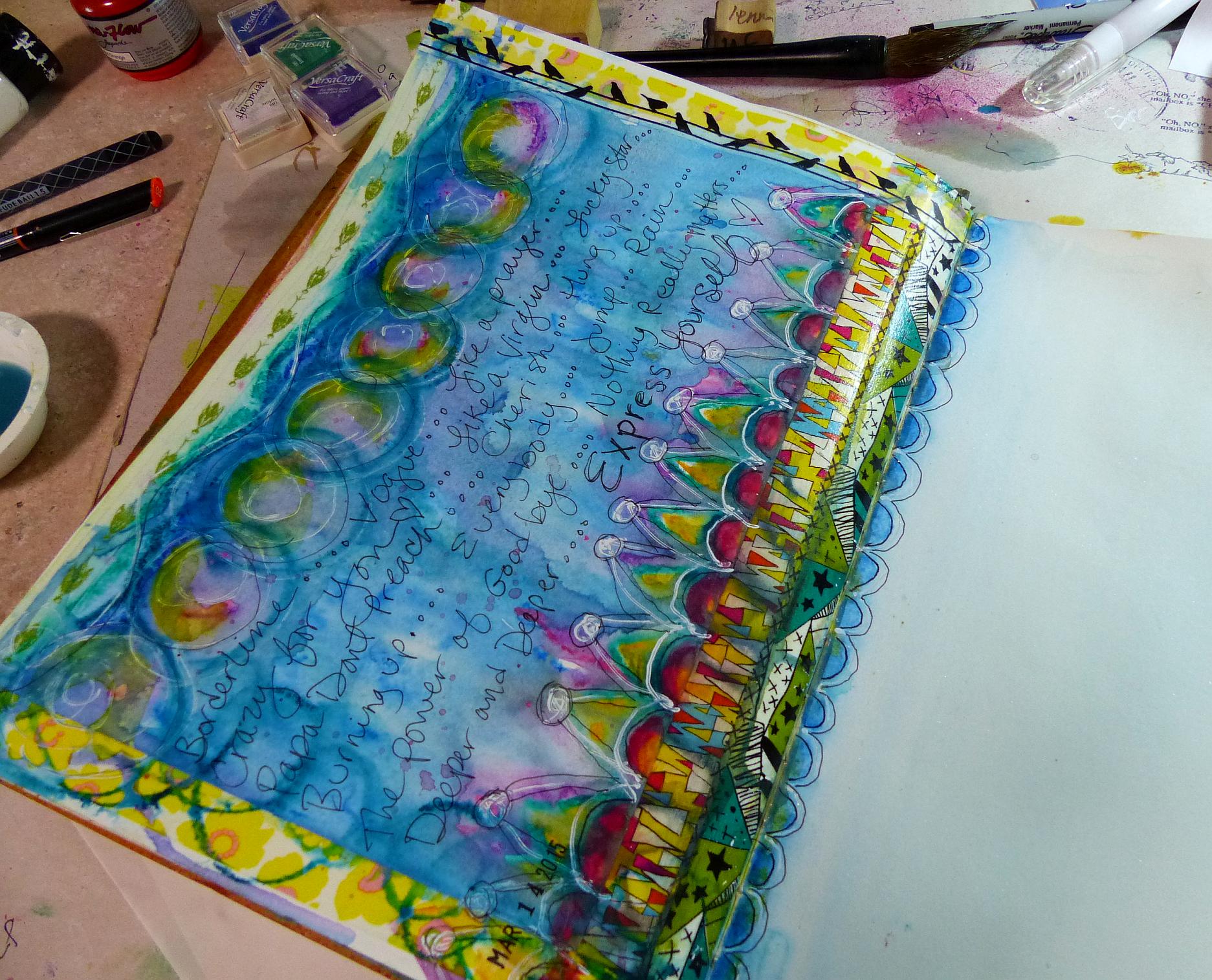 Then I doodled more with the watercolor crayons, a black permanent marker and a white opaque pen. I even extended the border onto the next page I was having so much fun! 