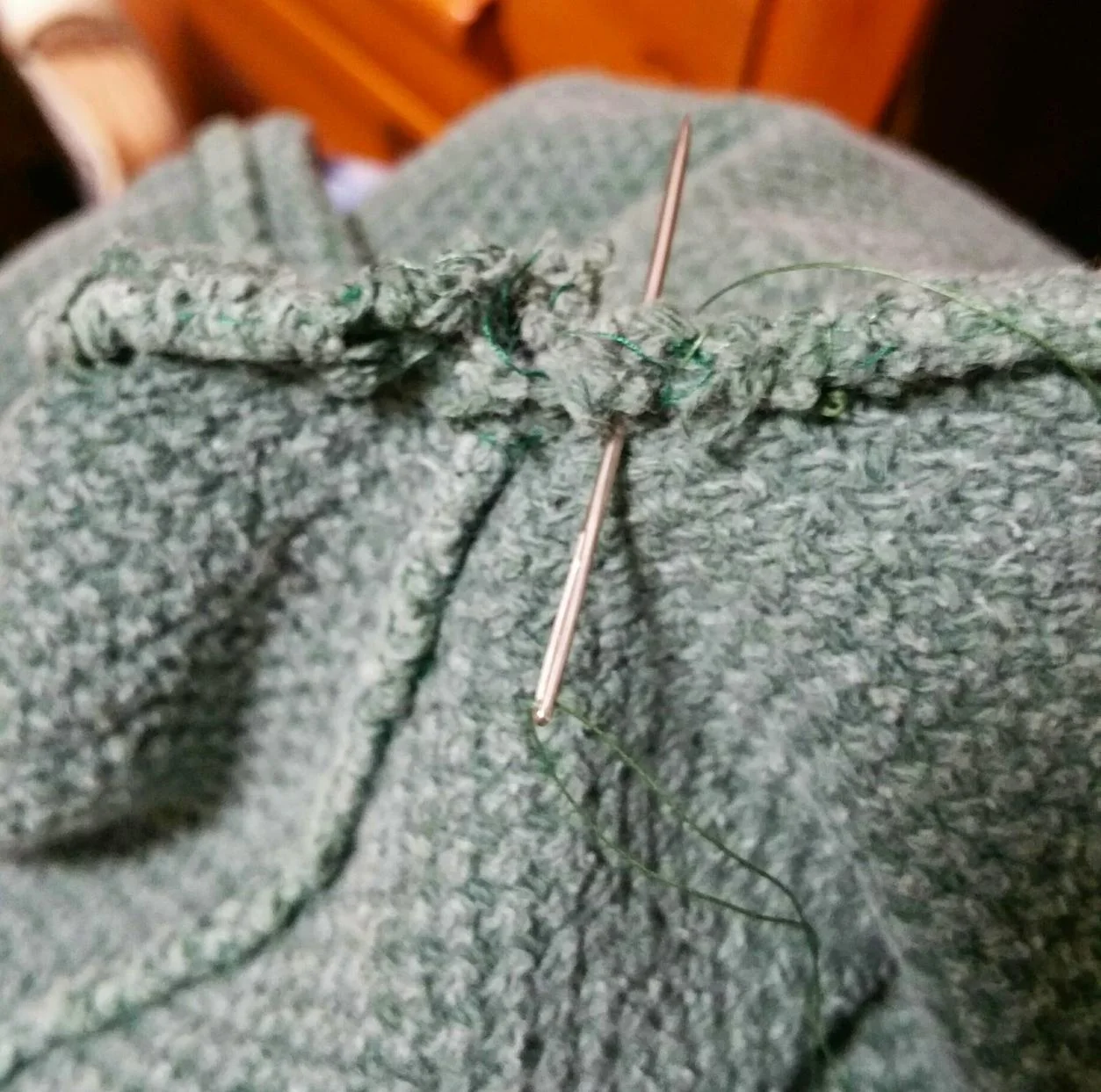 28. mending a sweater - May 8, 2015