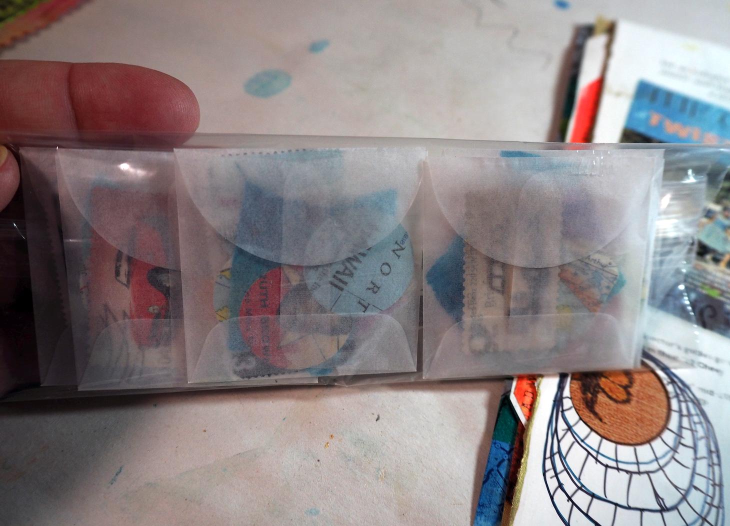 Tiny envelopes of goodies for all