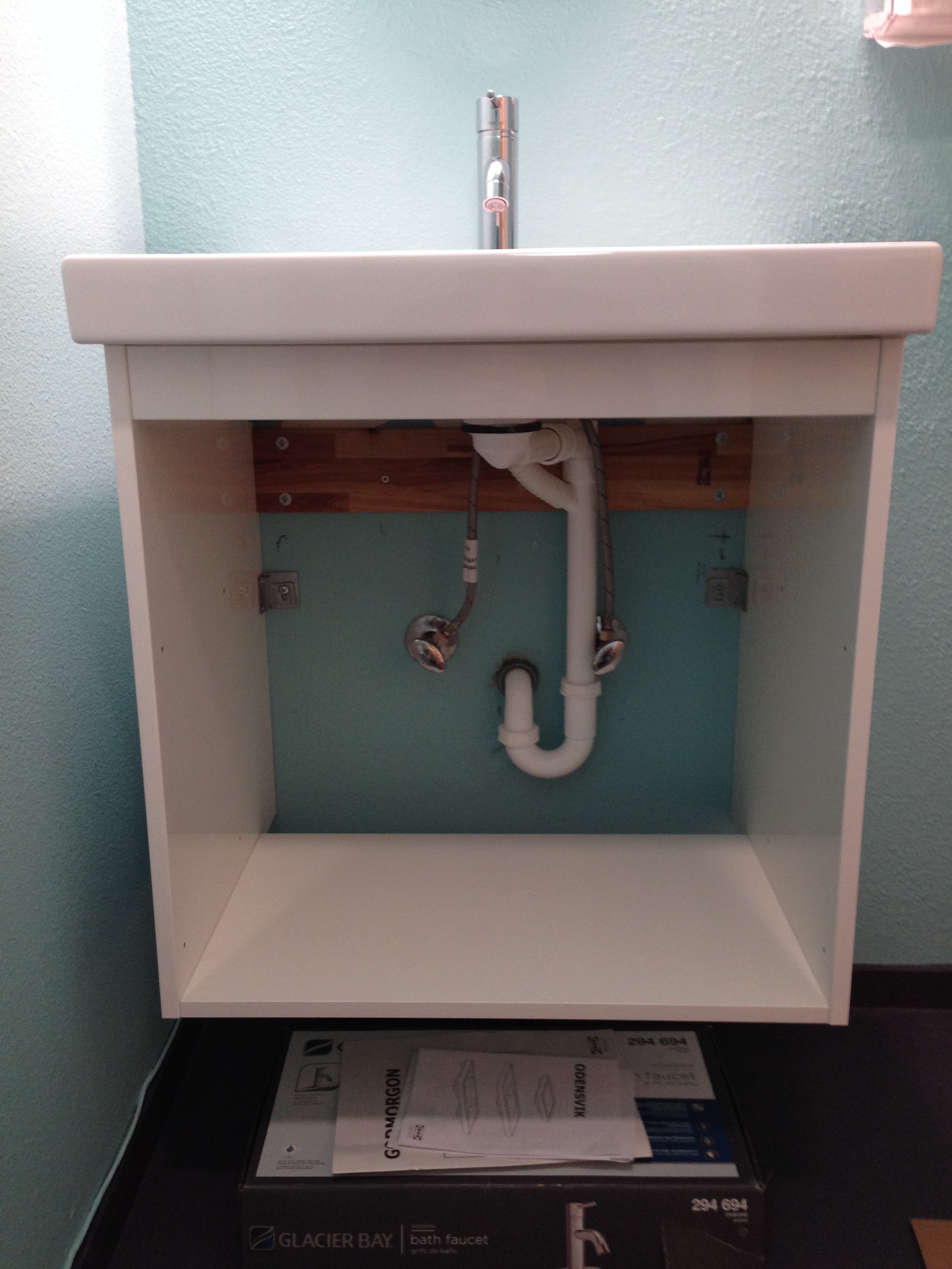 Floating Cabinet with new Drains and Faucet