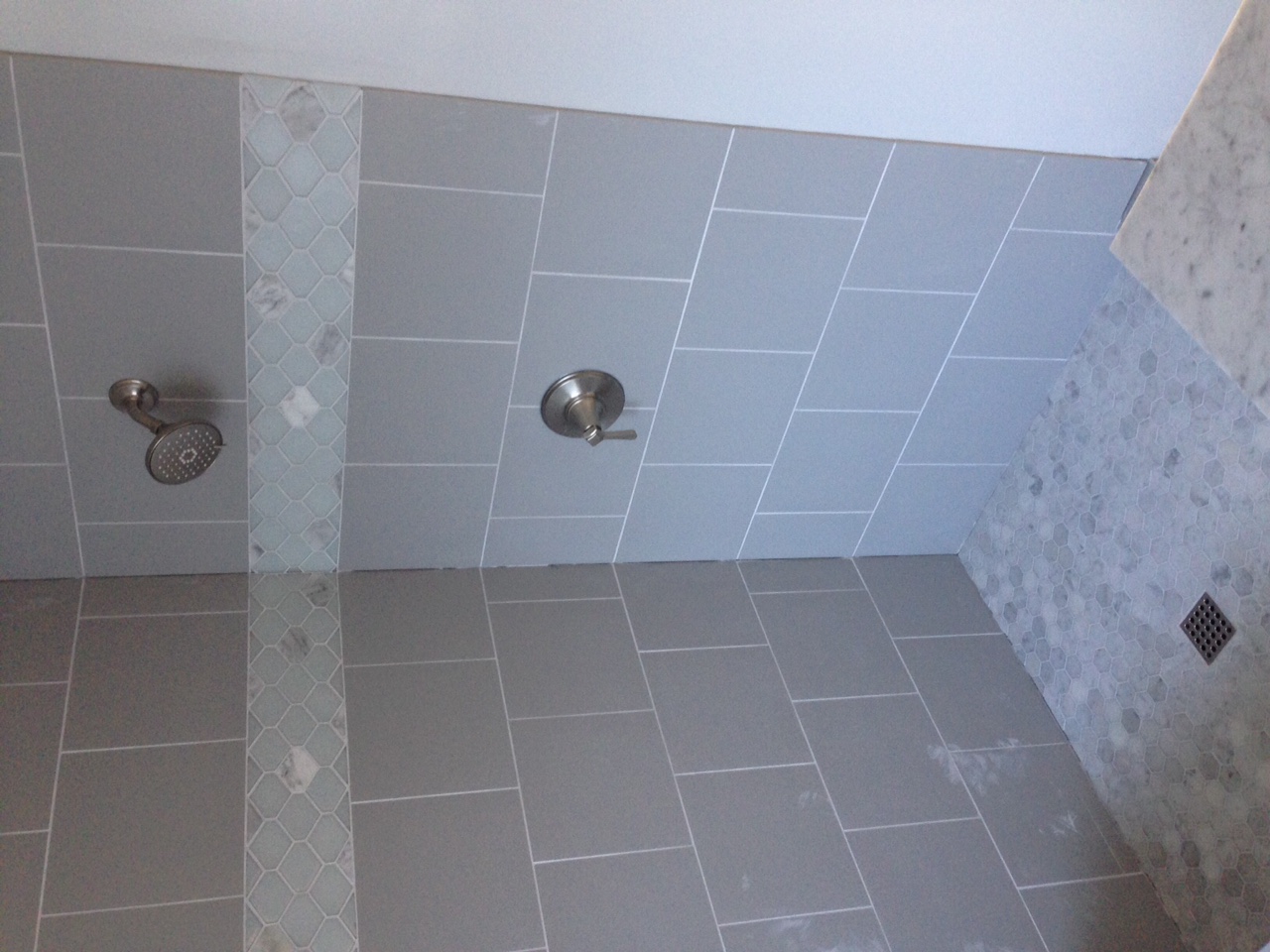 Finished shower with new shower valve and trim