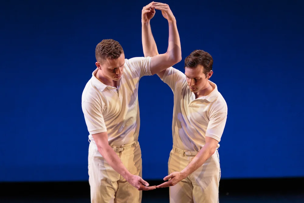 Tobin Del Cuore and Garrett Anderson in Lar Lubovitch's Concerto Six Twenty-Two .