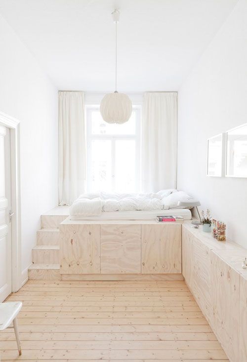 A great way to get more space specially in the bedroom is to build up, because here you will usually not need at lot of hight in the bed area. In this way you will create a lot of extra storage. 
