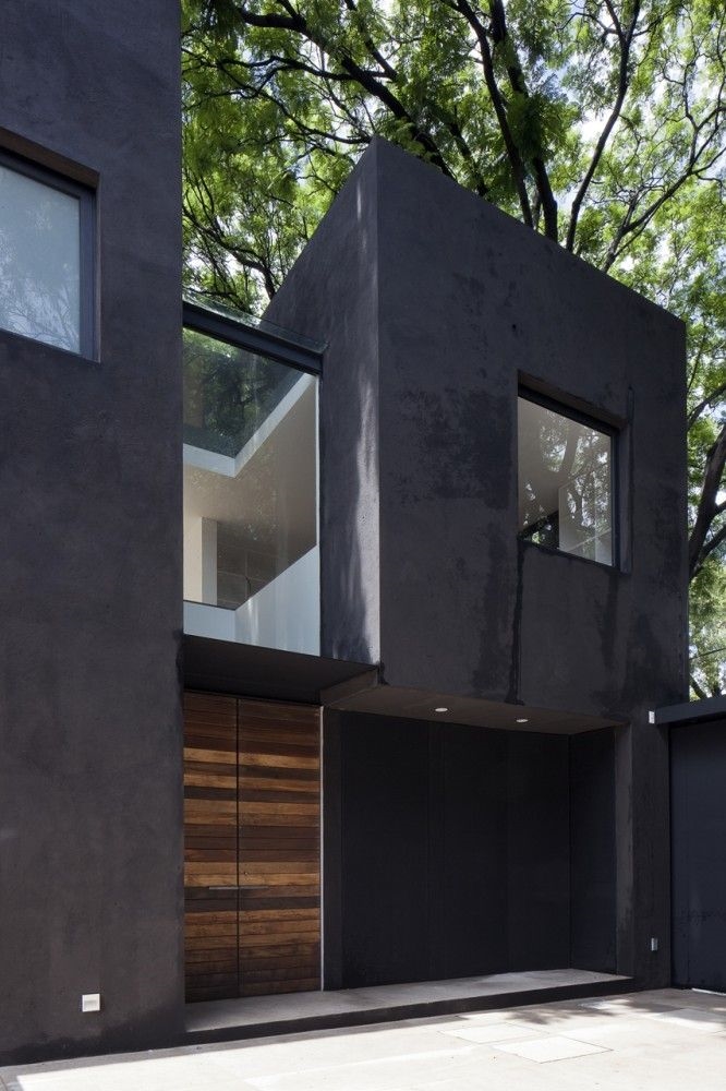 Privat house with black exterior. It strengthen the look of the house.