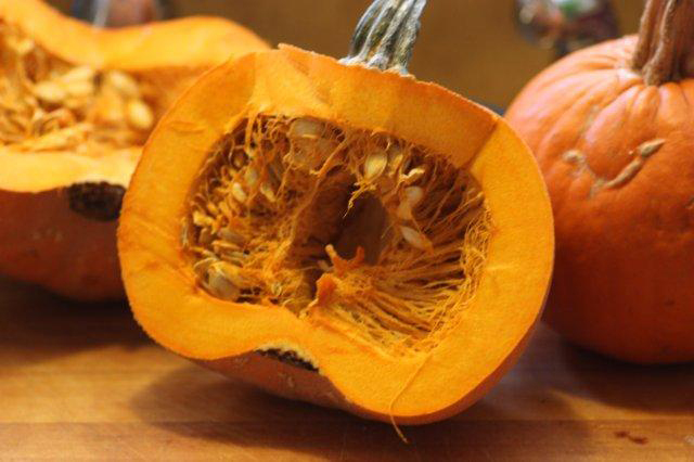 This 'Winter Luxury' pumpkin half needs to be cleaned and the seeds saved for roasting.