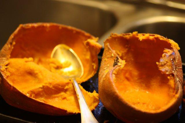 The pumpkin should be completely soft and easily scooped when fully cooked.