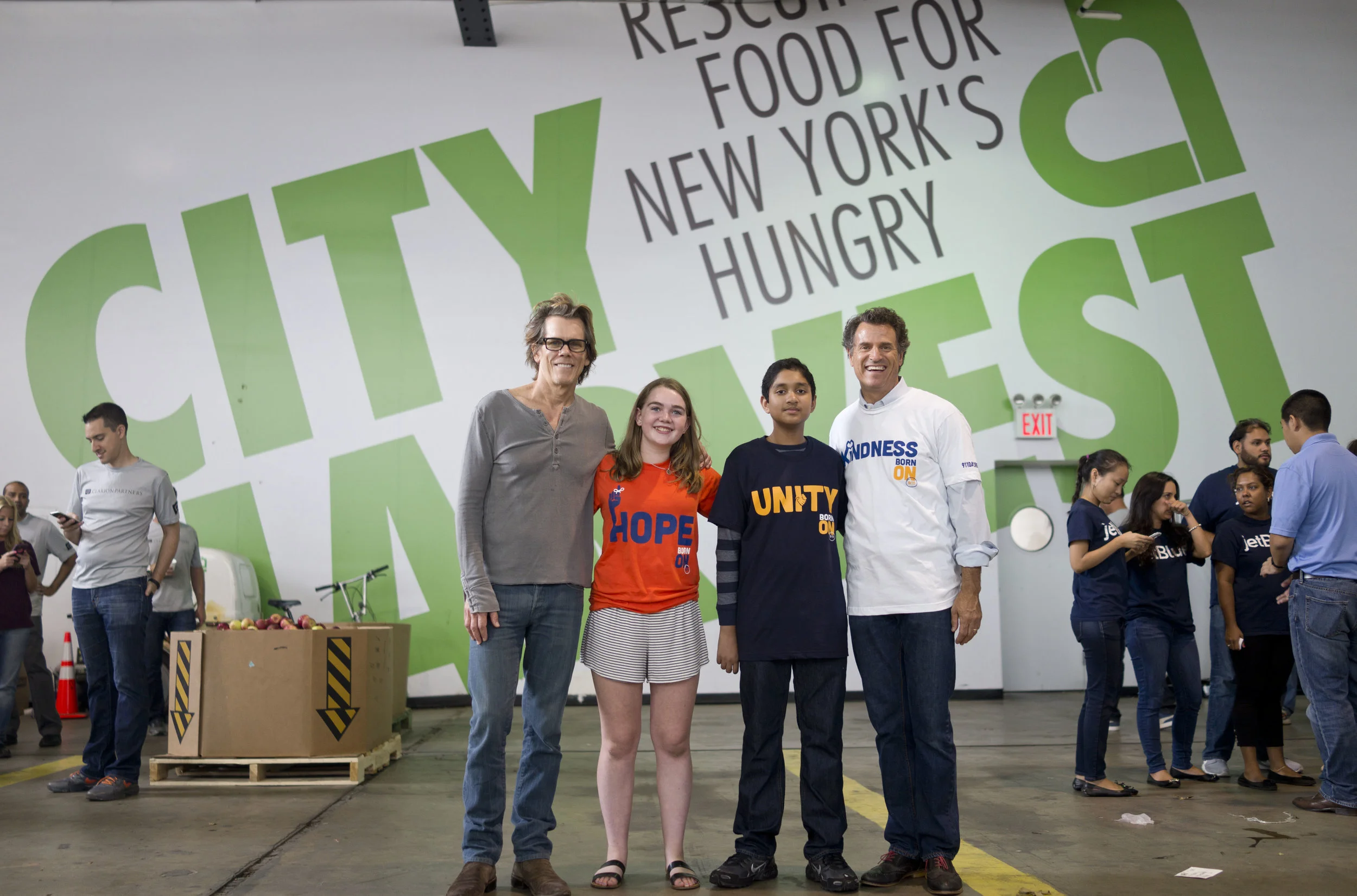 Kevin Bacon with Hillary O'Neill, Anish Shrivastava and David Paine, CEO and founder of 9/11 Day of Service.