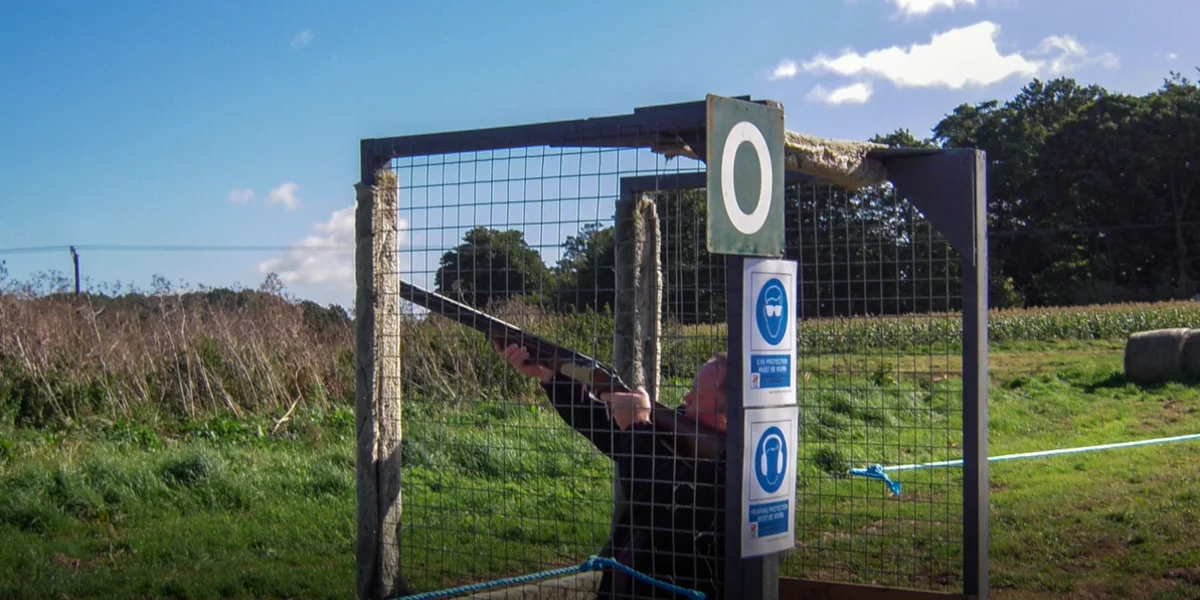 Still from Andrew Sizeland Drone Video - Shooter Has a Clay in his Sights Ready to Shoot at Chalk Farm Clay Ground