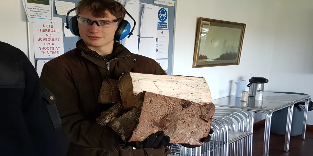 George Howling ensures that the wood stove has plenty of fuel to keep the club house warm on cold days