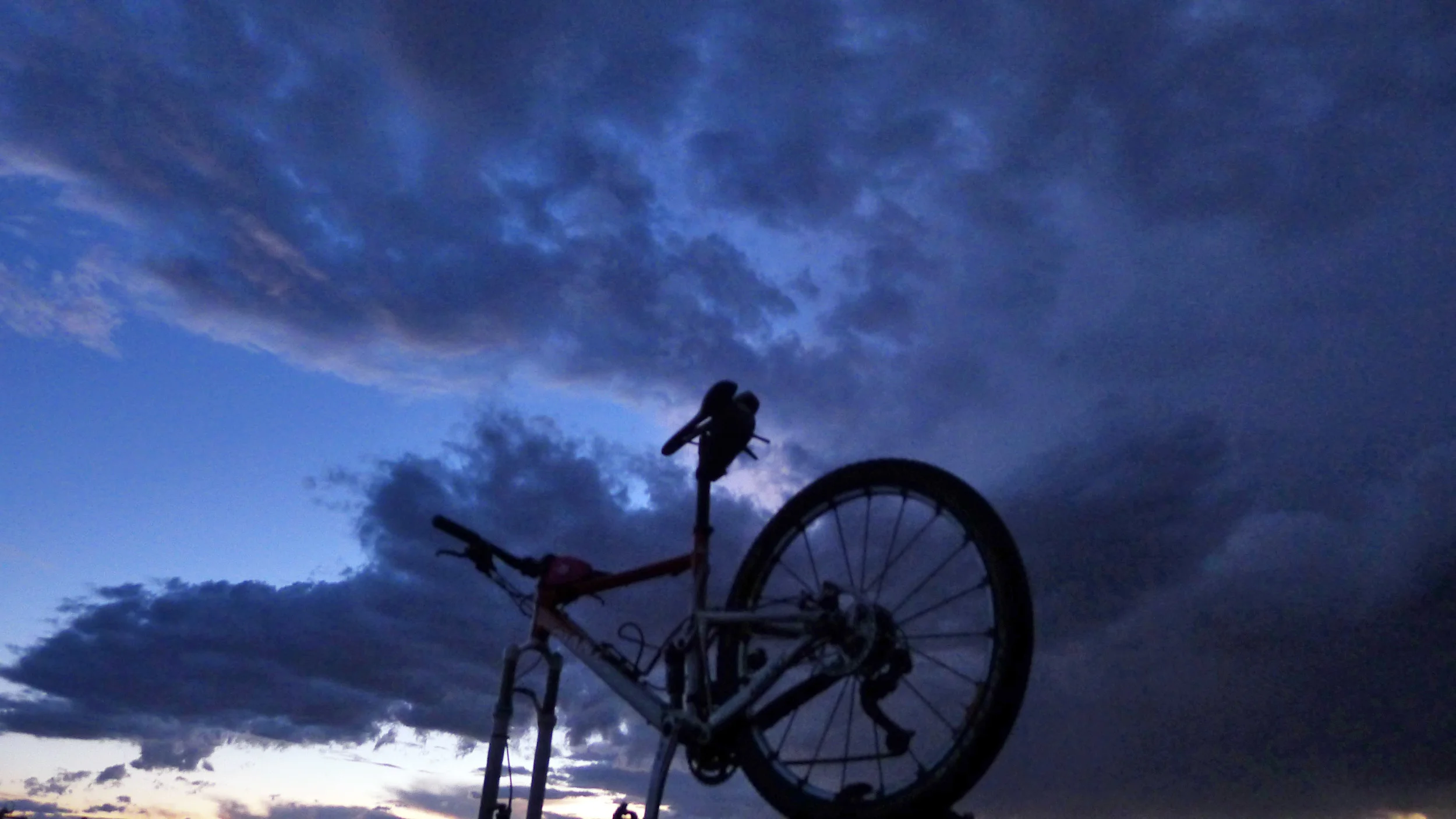 Blue sky and bike siloette