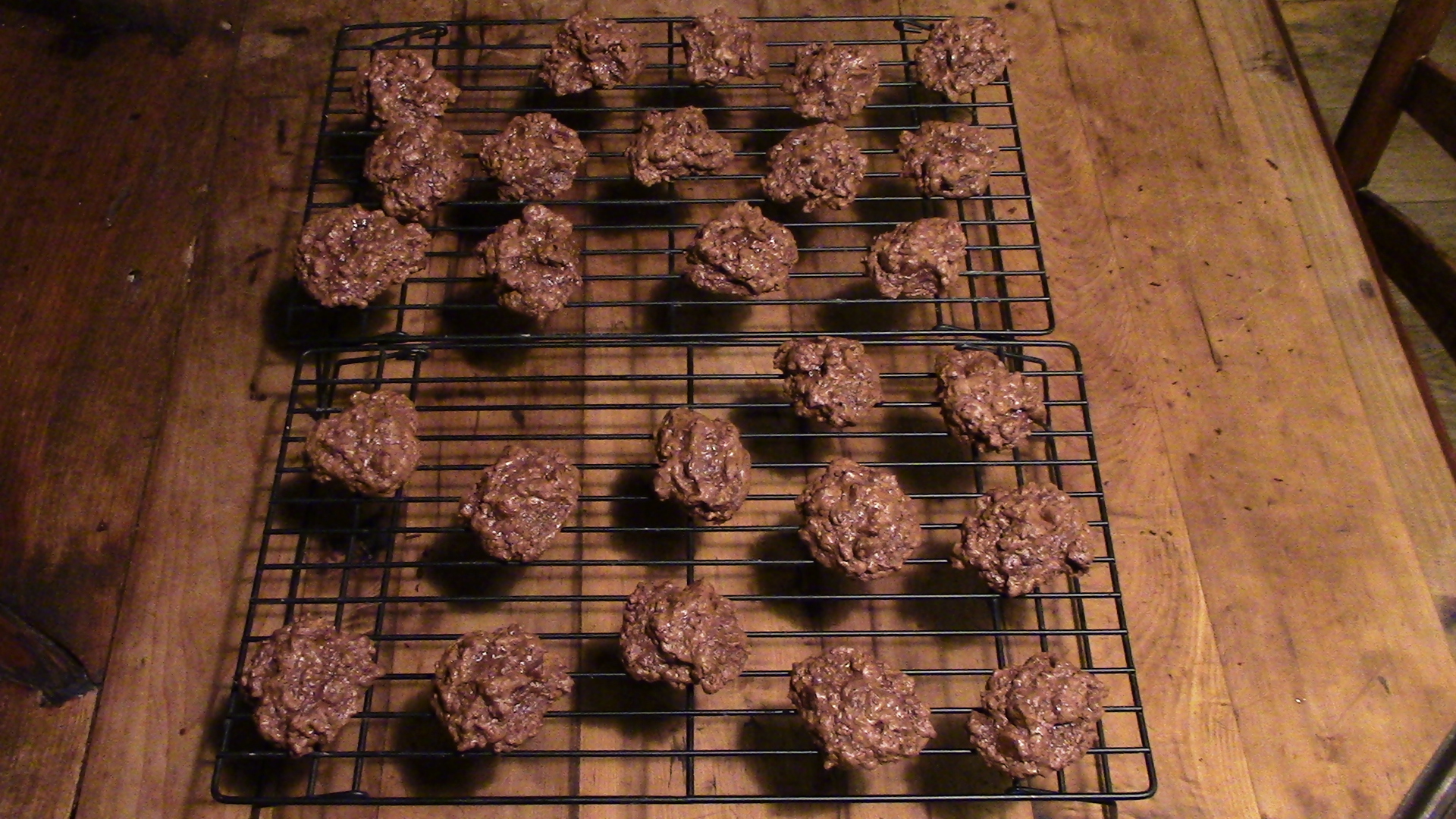 After baking, cookies are removed from the baking sheet with a spatula and left to cool on racks.