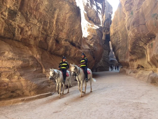 Jordanian police on patrol in the Siq