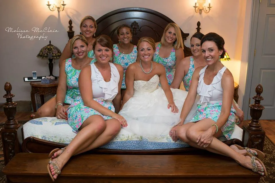 Bridal party in the Houghtelin’s Hideaway room Photographer's Website: www.melissamcclainphotography.com