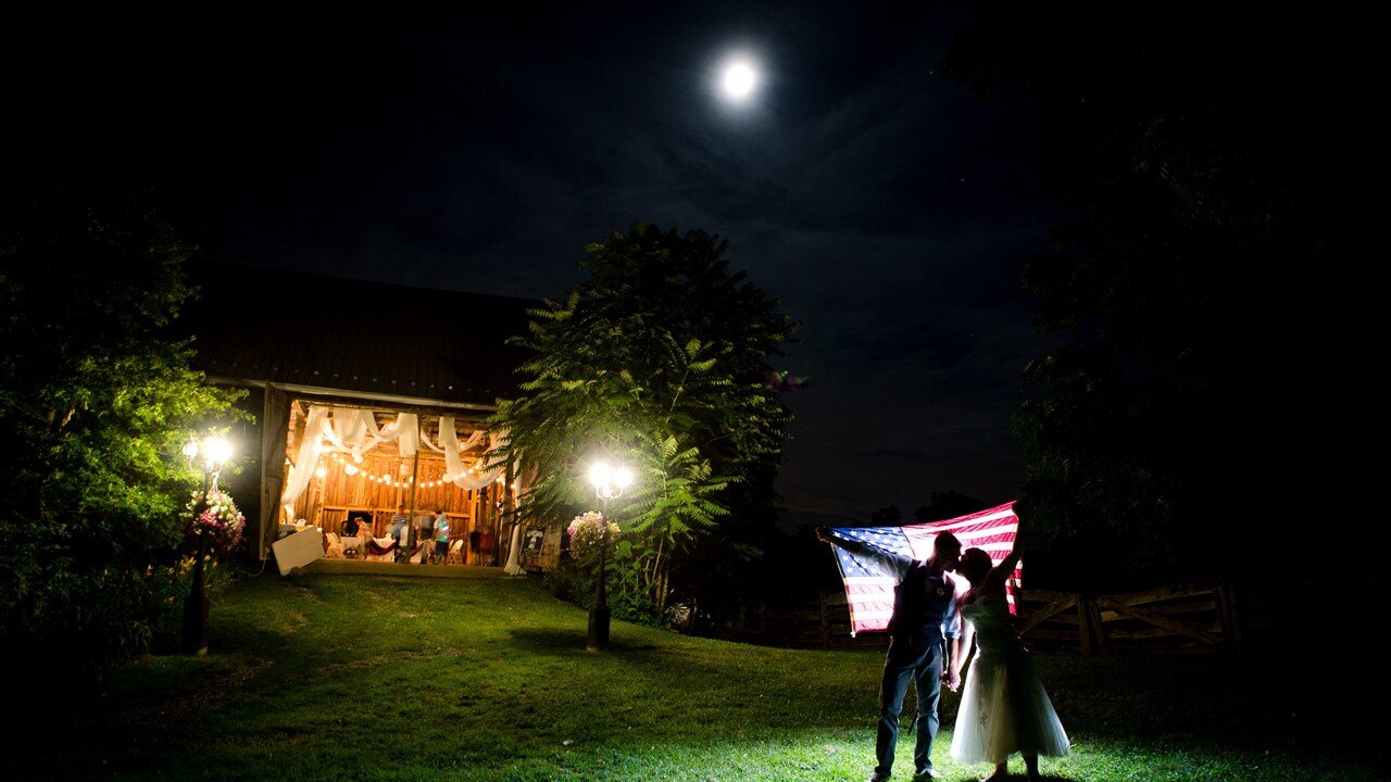 Barn Glowing at Night with a Kiss