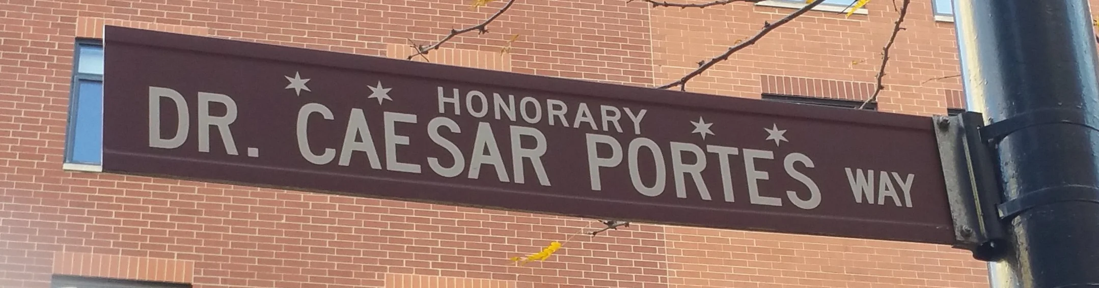 Honorary Dr. Caesar Portes Way near the former the George and Anna Portes Cancer Prevention Center located on Huron Street