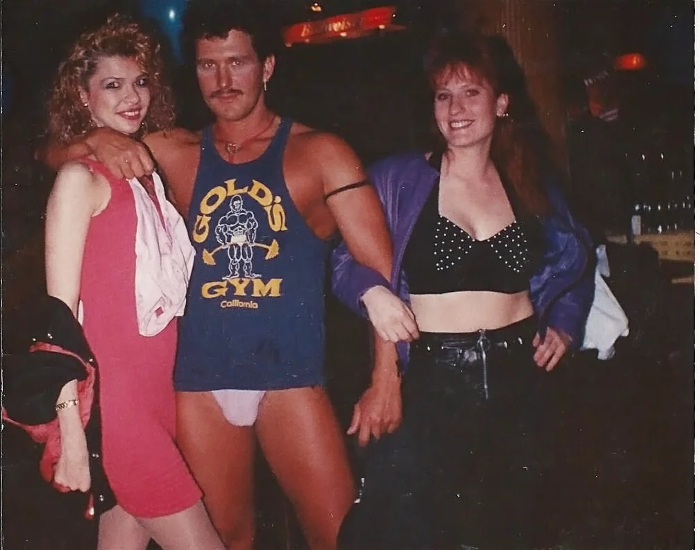 Me, some random stripper, and Trish. No, those are not my panties he's holding. He did have an impressive mullet though. This was taken at Joshuas in Grandview, MO. It was a club in a crappy hotel that we went to ALL the time. I was 21, I think Trish was still 20 - not even legal ;) Course, we did lots of things that weren't legal then LOL! I loved her dearly, one of my eternally EPIC BFFs