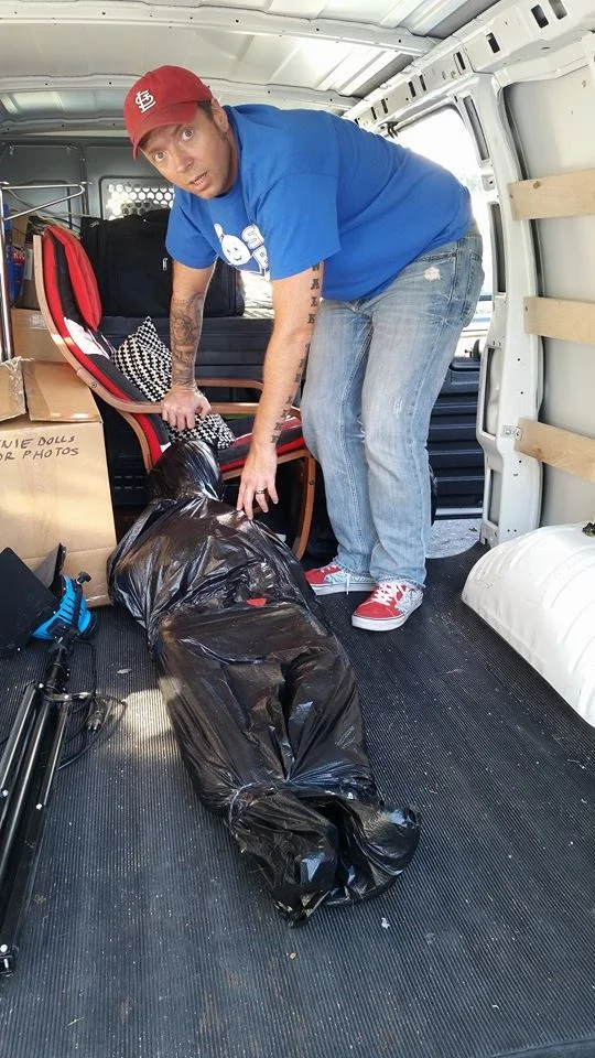 Don't mind us and this dead body we are heaving into the van, Mr Man in the Alley. Nothing to see here. Nothing at all.
