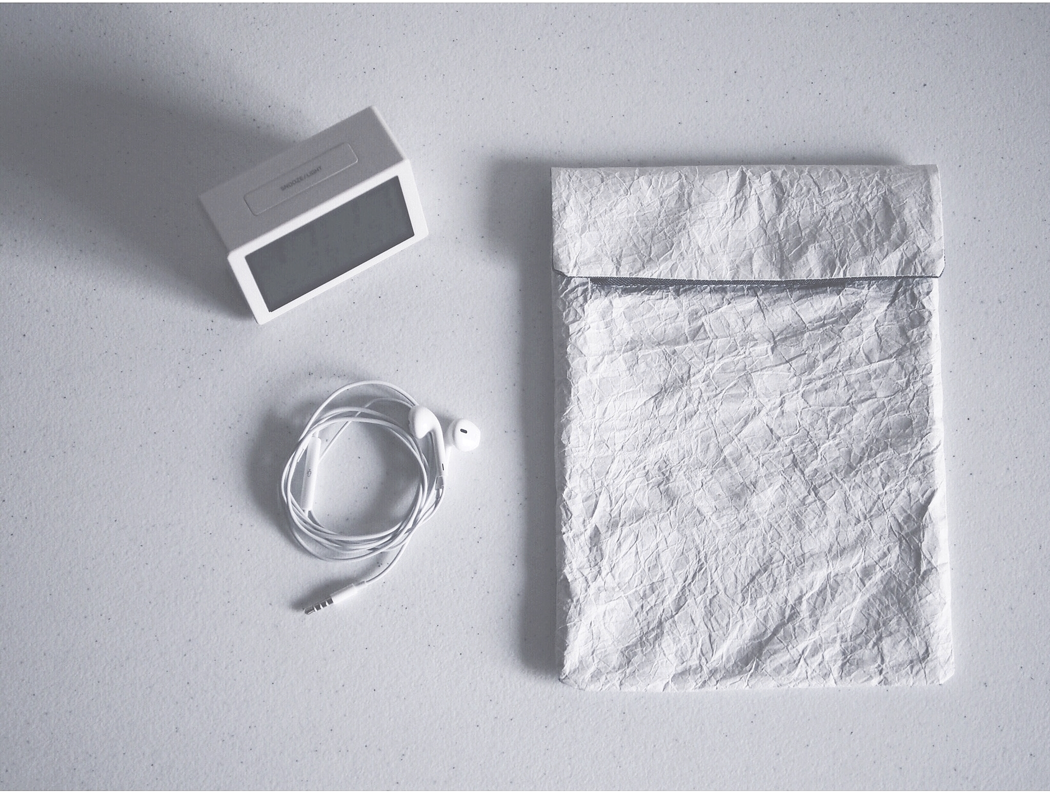  Washi Paper Ipad Sleeve is a 2 day project exploring the possibilities of paper as a textile. Tyvek paper, although may seem flimsy like paper is actually water resilient as well as tear-proof. It's lightweight and very suitable for daily utility. 