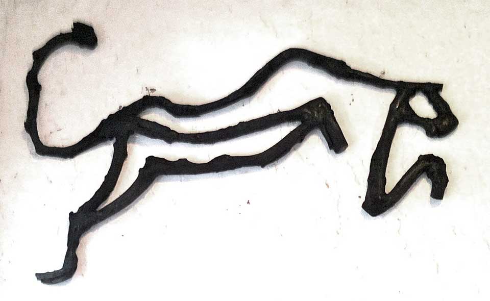 Leaping Leopard . Mopane heartwood and steel. 200 x 115 cm. (2012)
