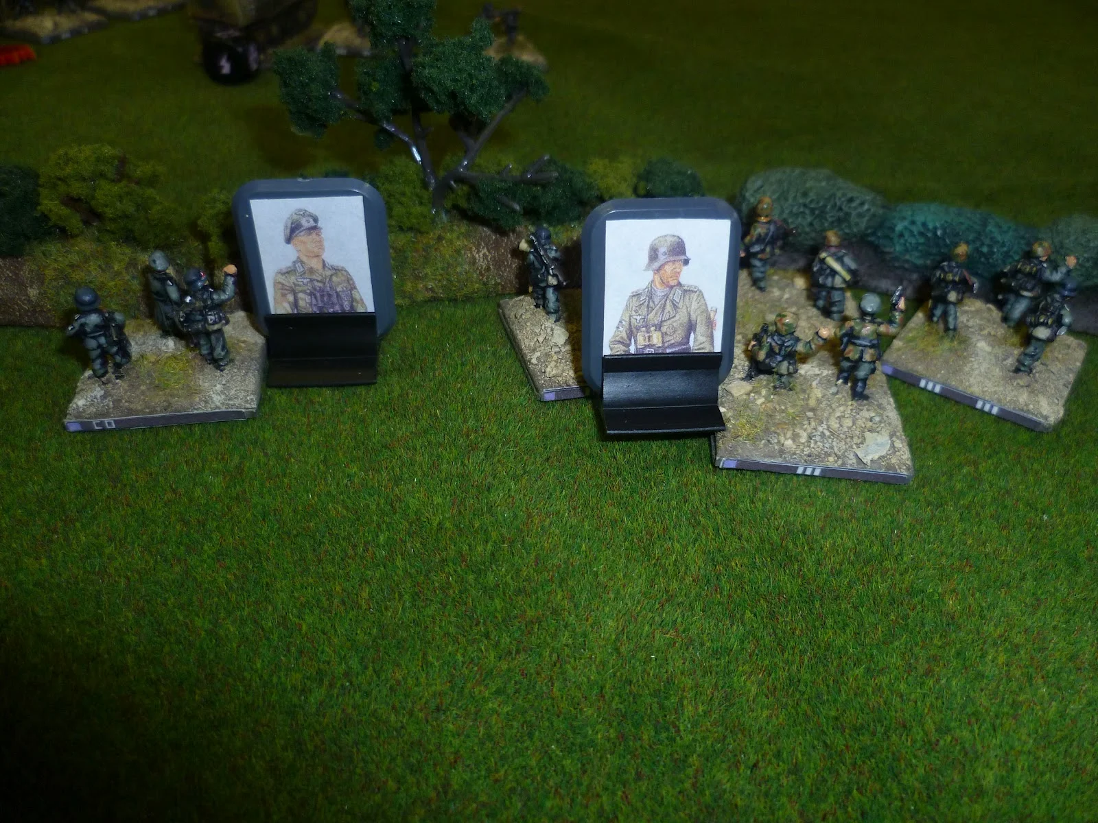 The German Company Commander Hauptmann Pfefferbeisser and Zug 3 leader Feldwebel Bratwurst observe the initial stages of the battle