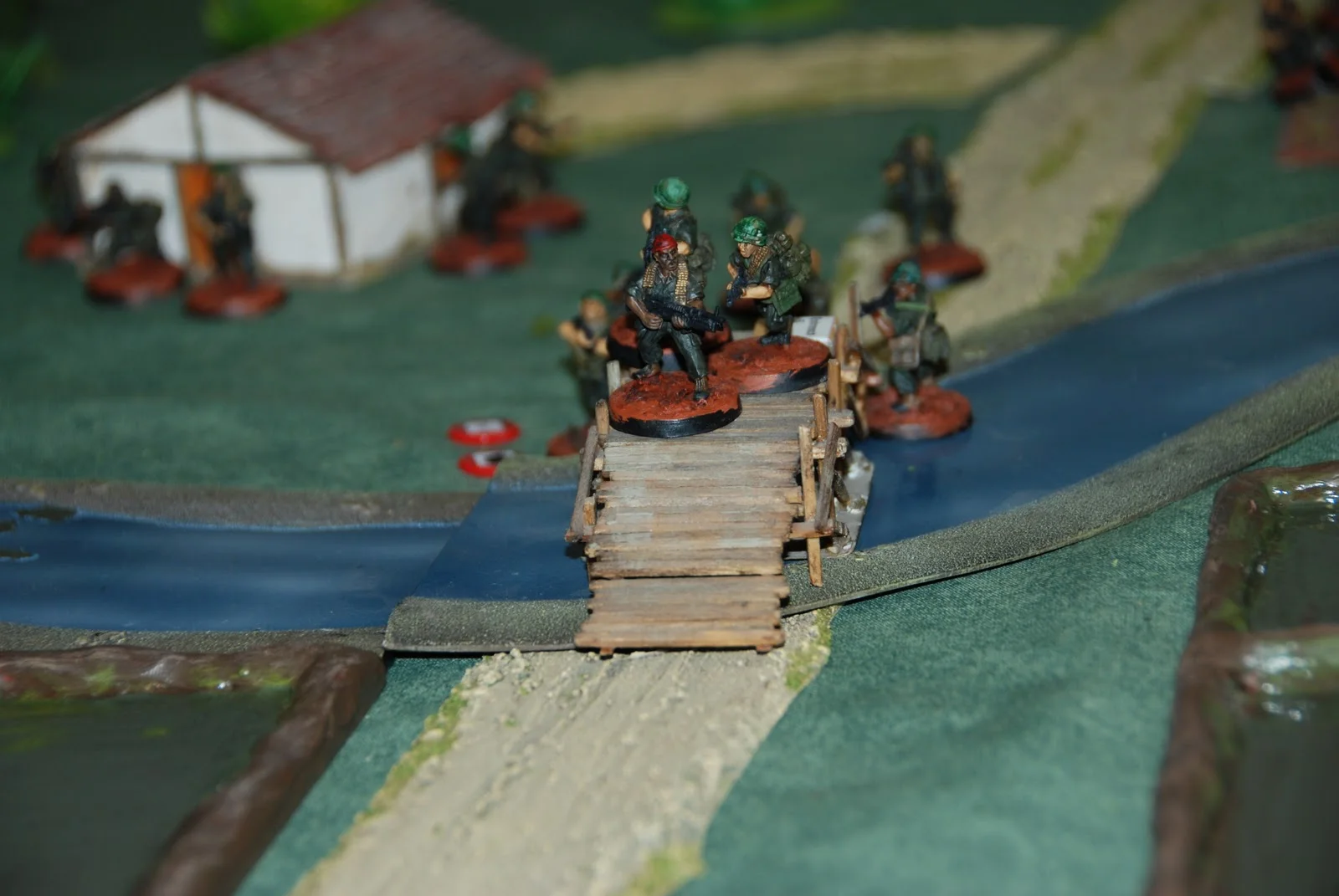 Baker team cautiously crossing a bridge