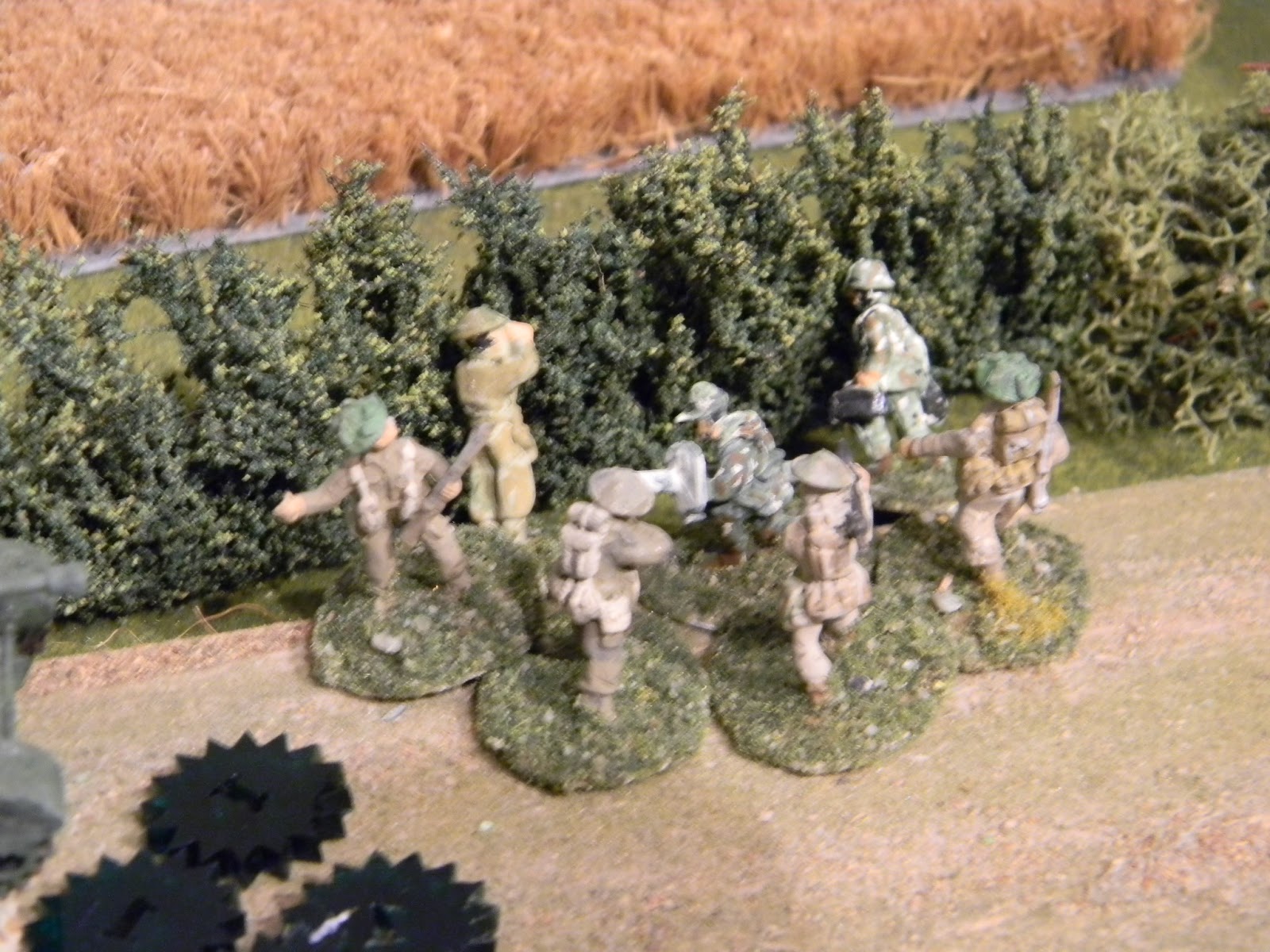 British infantry hug the bocage.