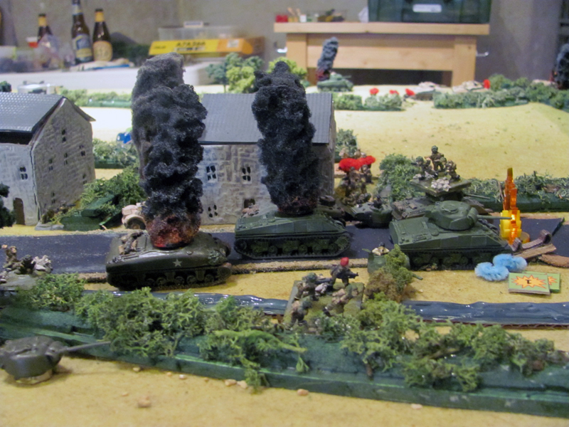 British Shermans come under fire from the German PaK 40 Anti-Tank gun