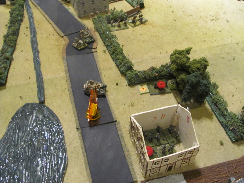 Danger! A Vickers MMG carrier braves their own artillery fire to get into position to engage the Germans in the town (and escape the PaK40!)