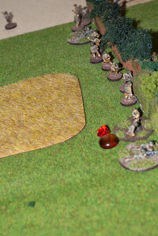 Stuck behind bocage, under 81mm barrage. Platoon had seen better days.