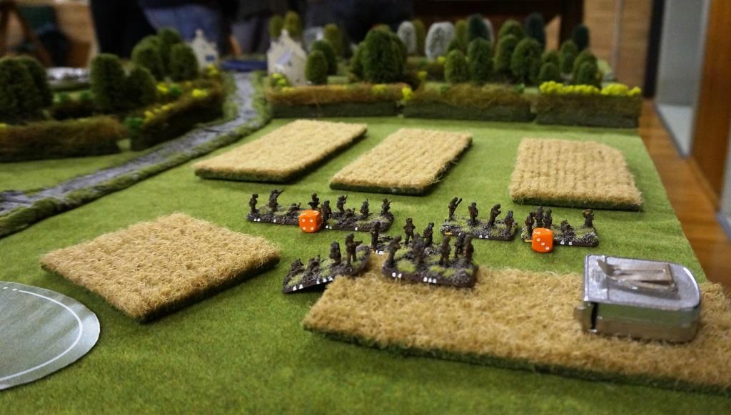 1st Platoon faces off against 1. Zug (behind the hedge)