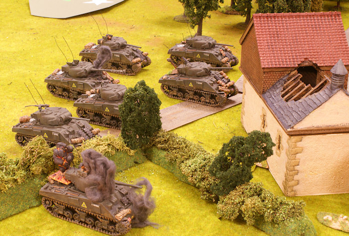 The panzerschreck team has time to fire at Cpt. Beaumont’s tank and destroyed it.