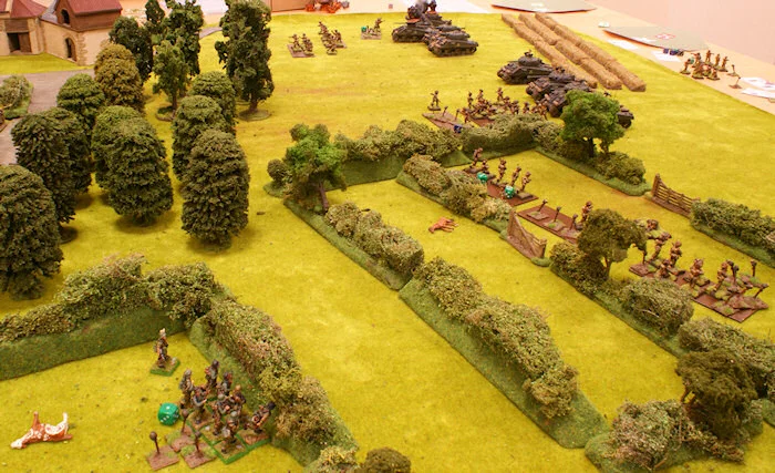 In the background, the 3rd platoon is under fire and one section withdraws. The 1st and 2nd platoons’ units have lost their bottle and withdrew.