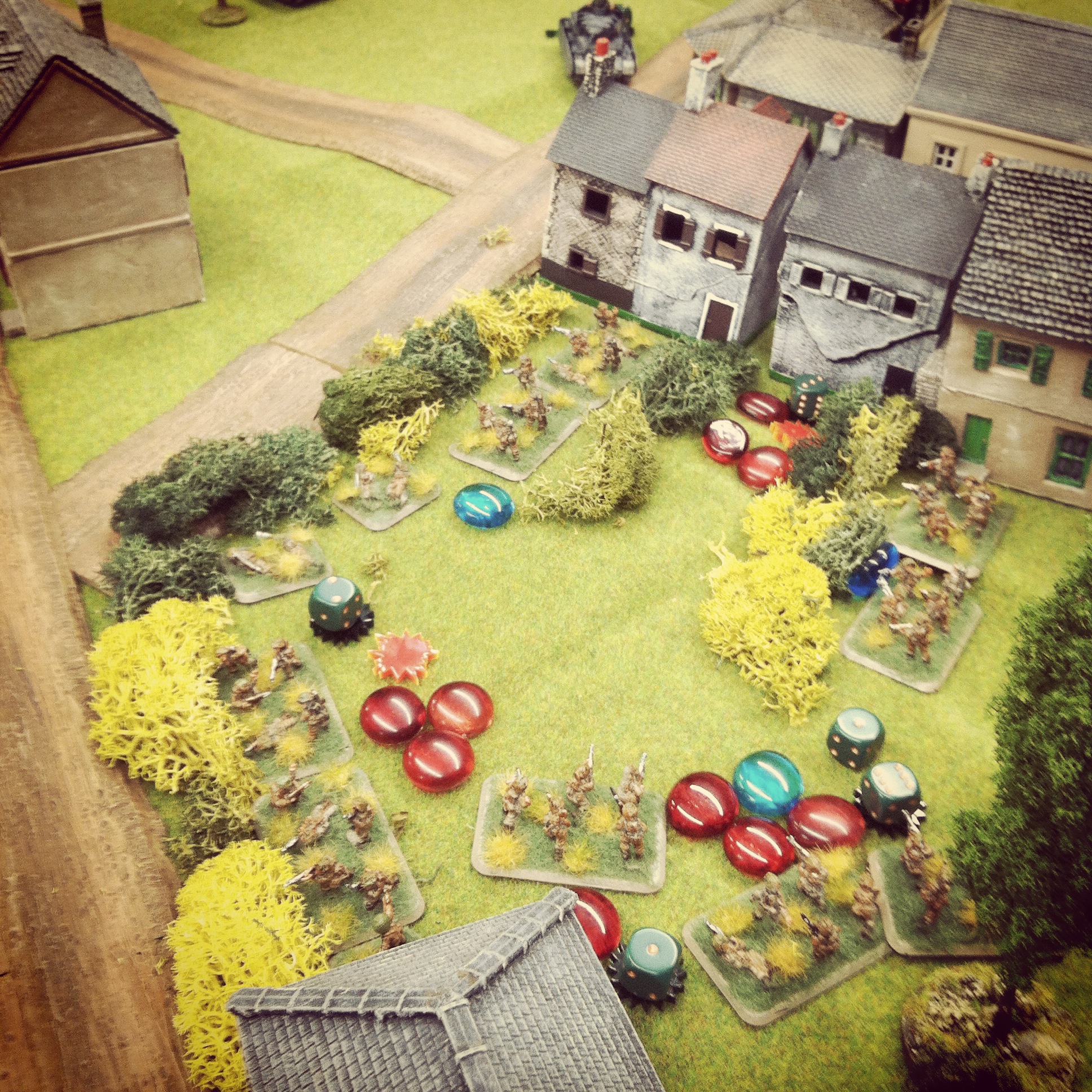 Canadian infantry press forward through vicious fire at the center of town