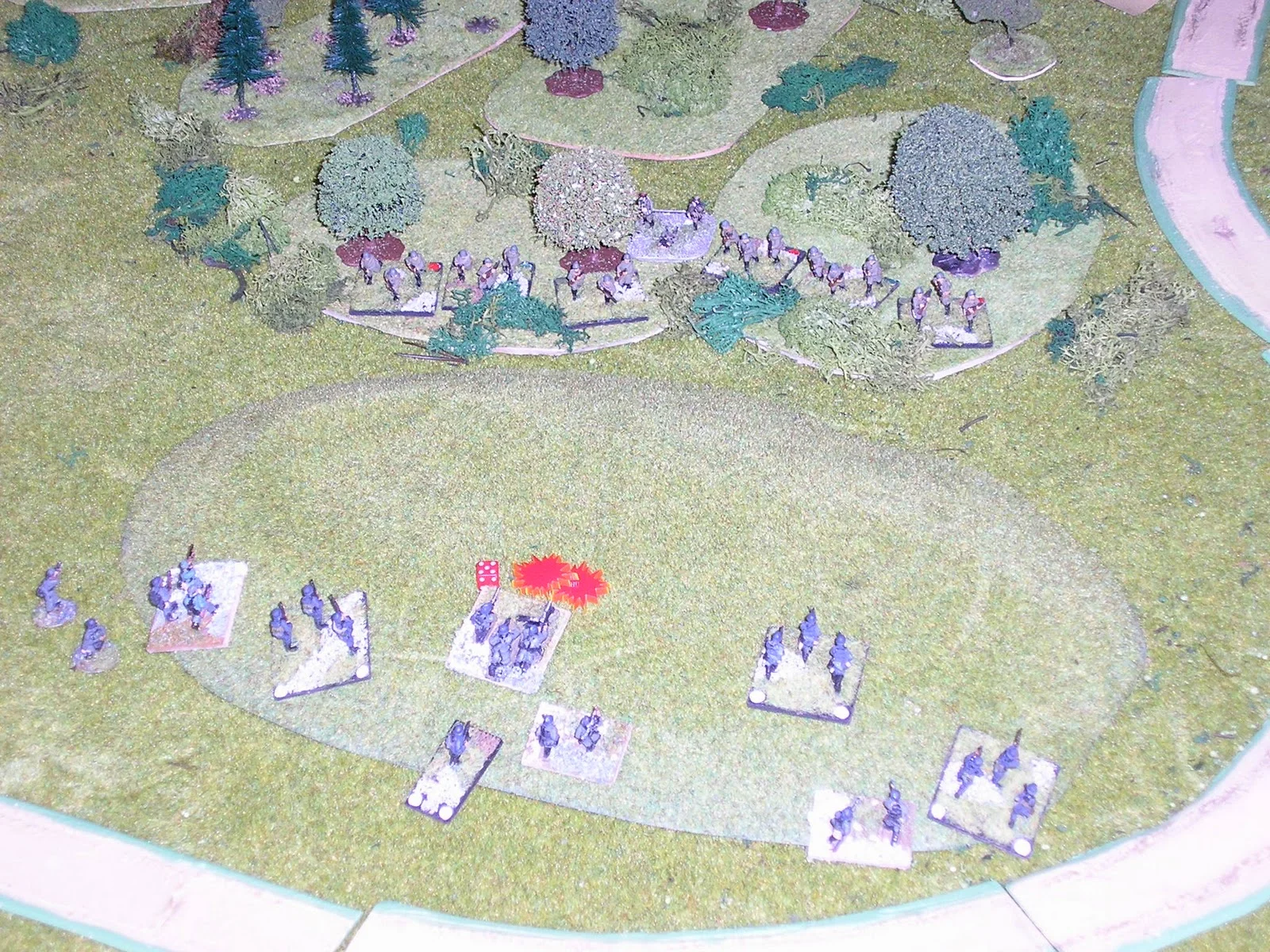The lead section of German 2nd platoon is suppressed and falls back from shock having been shattered by two Soviet sections in the nearby woods