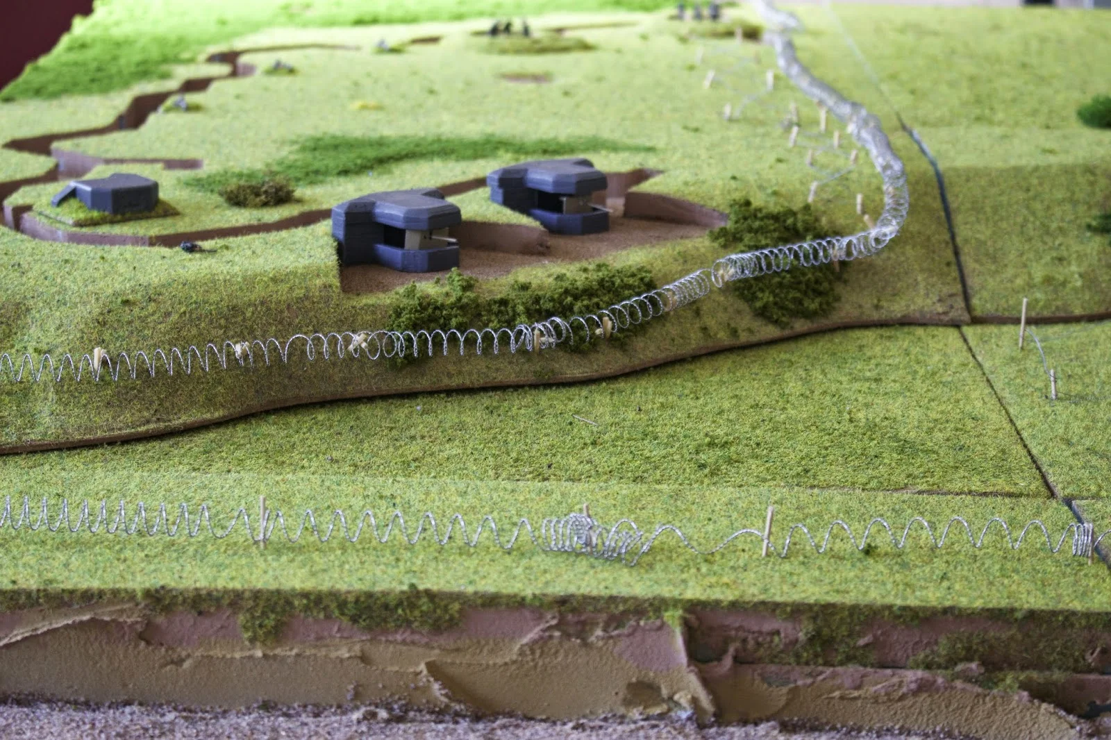 WN62 - left hand end of the German defences as the US see it. Two mortars, two 75mm Czech AT guns in bunkers, four MG42s in Tobruks. (This pic is from the playtest, and thus doesn't show the second line of wire on the cliff-top)
