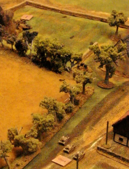 TKS tankettes moving into village