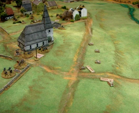 Tankettes moving back up to the church