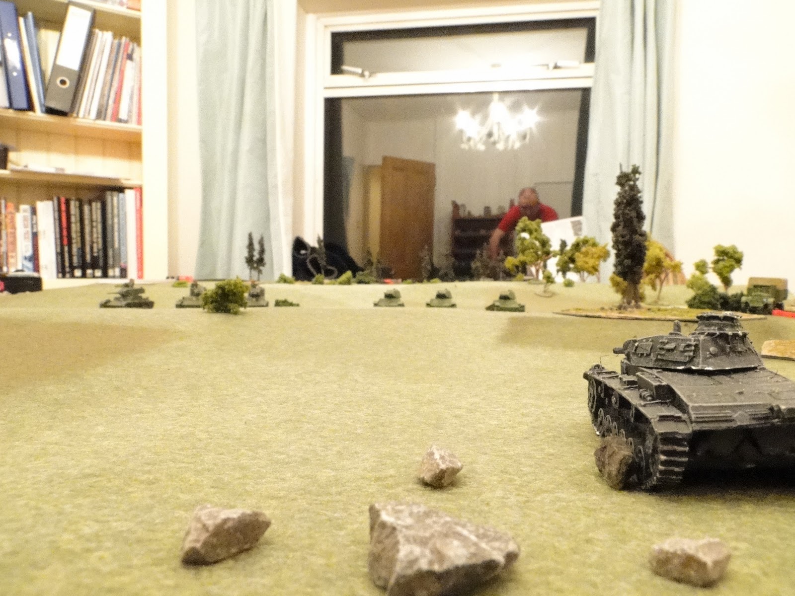 The Panzer IIIs clock two platoons of T-26s moving into hull down positions.