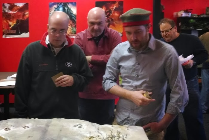 Here Barclay, Dean and Adam study the board while Dave looks at a different game